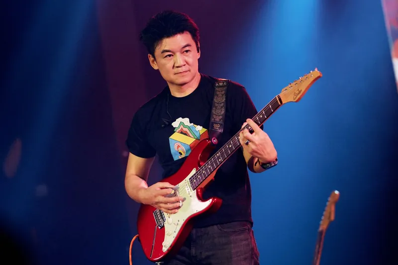 Alex on guitar